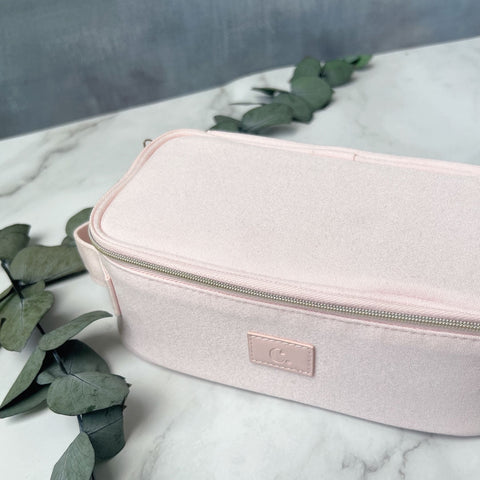 Trousse rose de toilette allongée