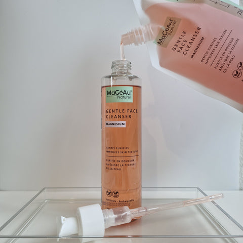 MaGéAu Naturel Gentle Face Cleanser bottle being filled with a pump, with a white background.